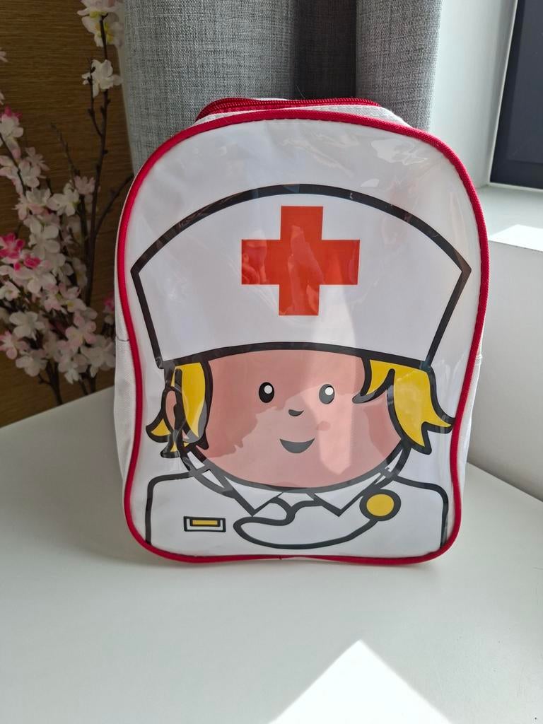 Dokterstas met jasje en veel spulletjes, Ophalen