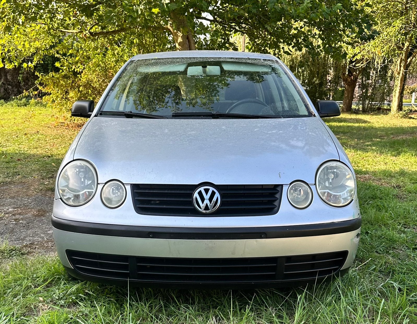 VW Polo (2002) • 1.2l Essence •, Voorwielaandrijving, Stof, Zwart, 4 cilinders