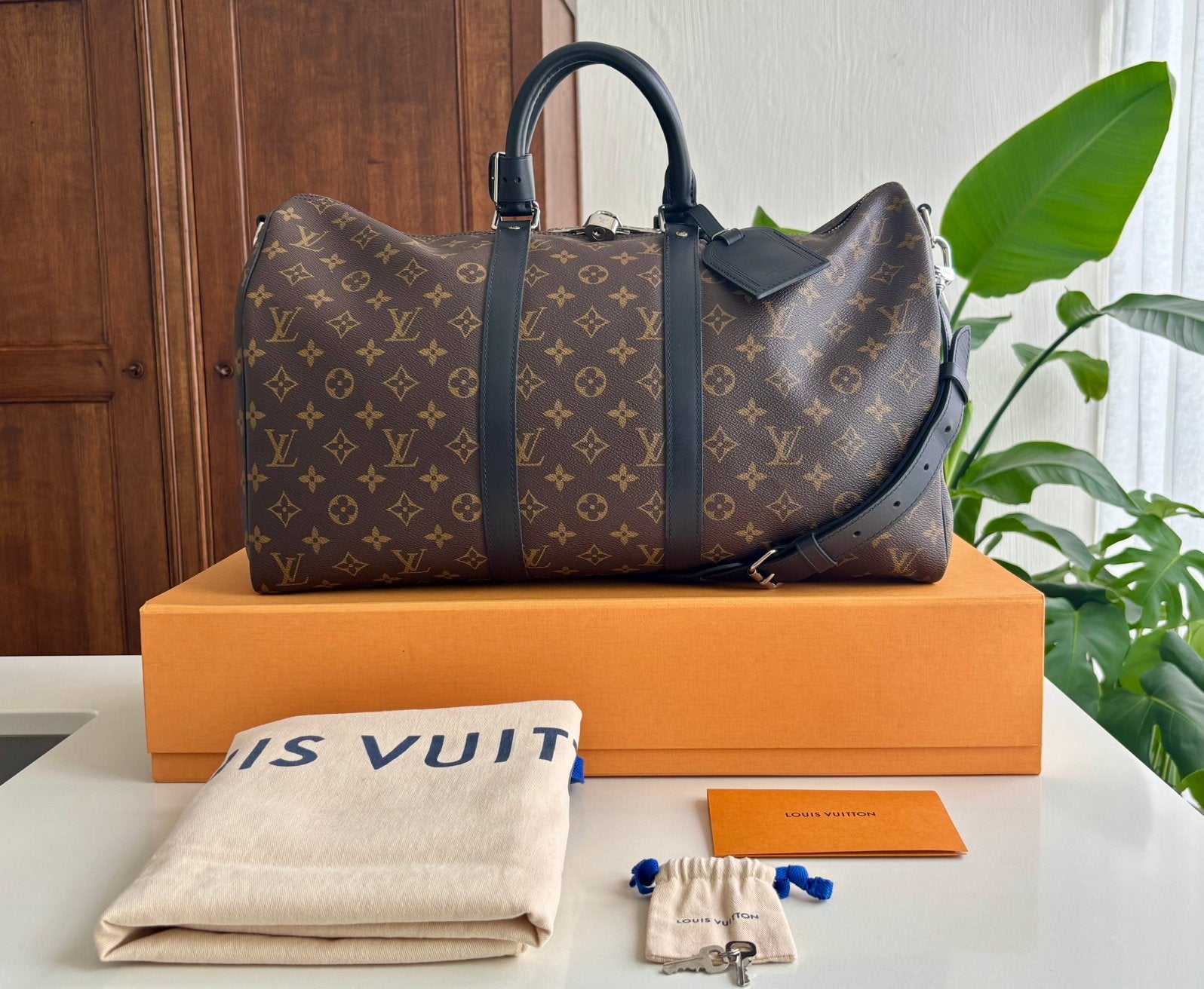 Louis Vuitton Keepall Bandouliere 45 en parfait état, Moins de 35 cm, Comme neuf, Brun, Enlèvement