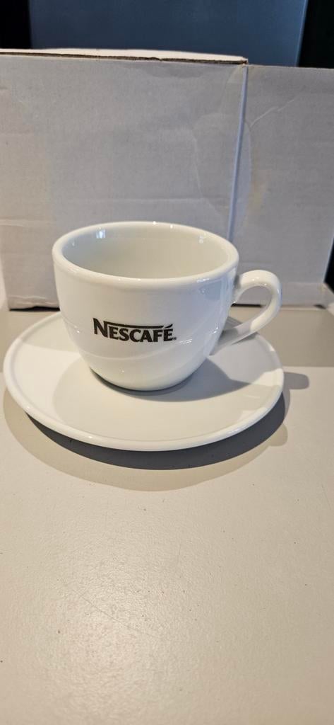 12 kopjes en schoteltjes Nescafé, Ophalen