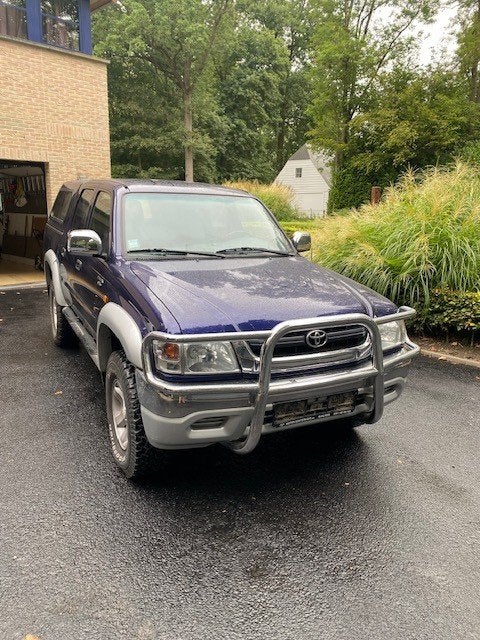 Toyota Hilux 2.5D4D SR5 *176.000km*, Autos, 75 kW, Achat, 4 portes, Boîte manuelle