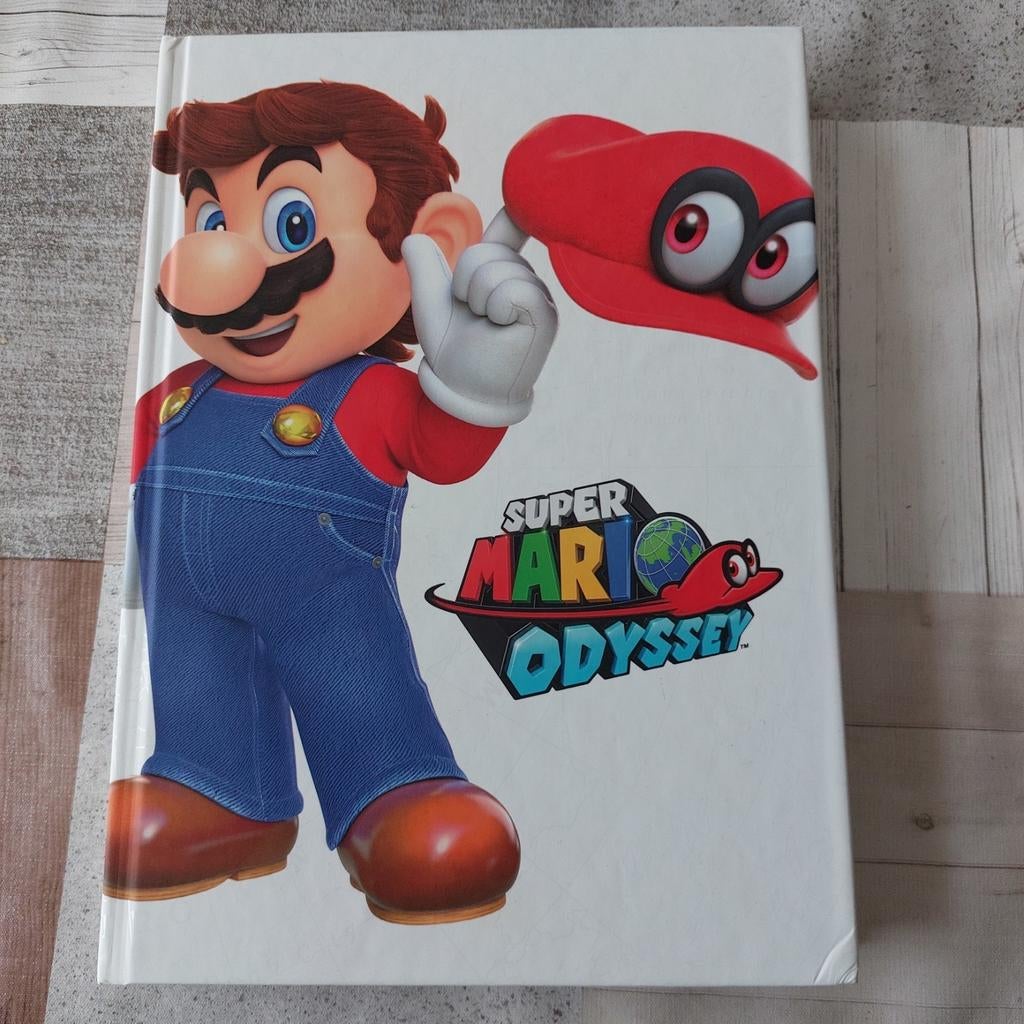 Guide à couverture rigide de l'édition Super Mario Odyssey L, Consoles de jeu & Jeux vidéo, Jeux | Nintendo Switch, Comme neuf