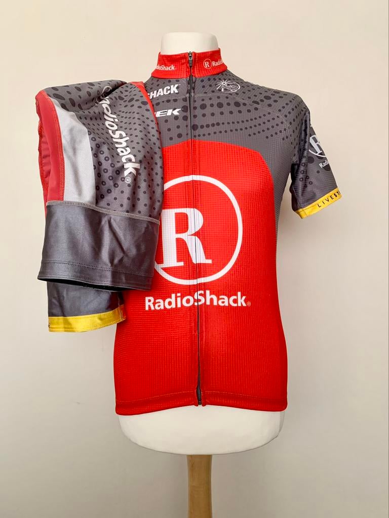 RadioShack 2010 Bontrager Trek Armstrong shirt + shorts, Gebruikt, Kleding