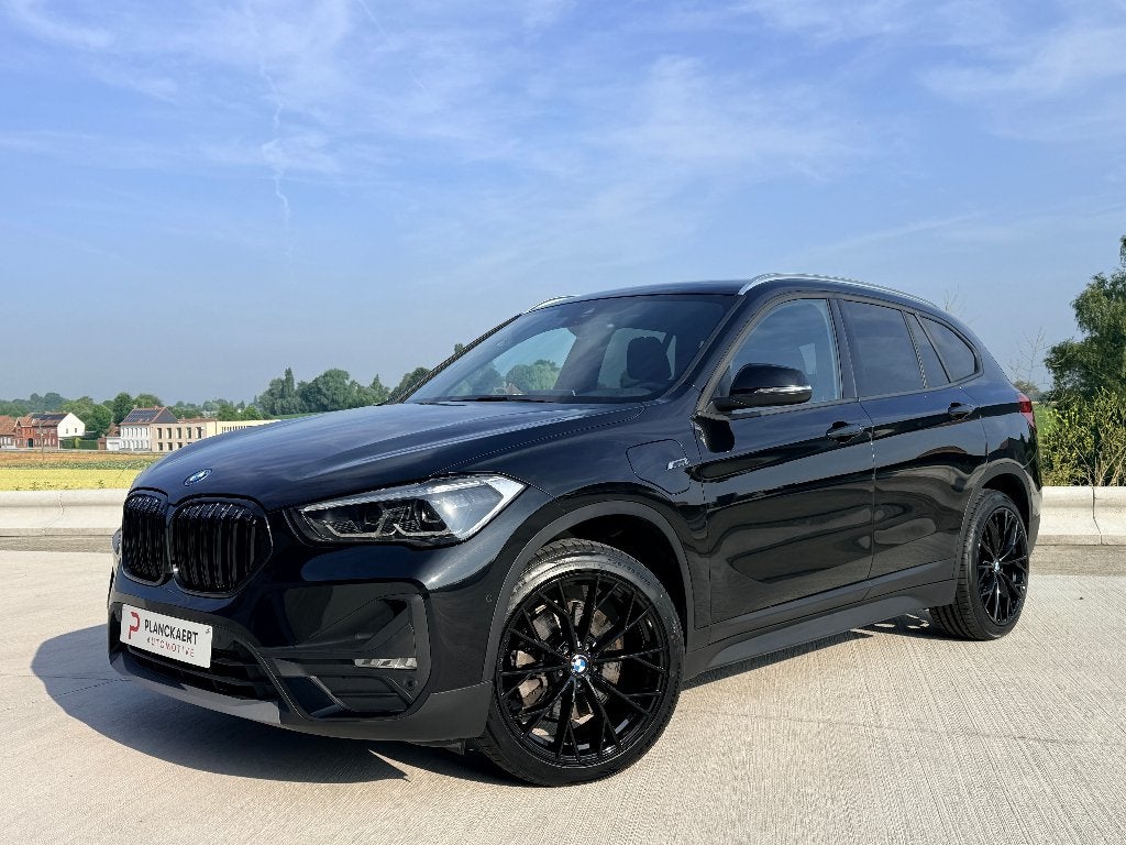 BMW X1 PHEV 1.5iA xDrive25e OPF *Navi/Gps/PCD/Camera*, Auto's, Stof, Lichtsensor, Zwart, 5 zetels