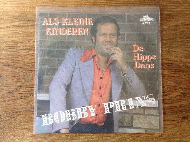 single bobby prins, 7 inch, Ophalen of Verzenden, Beschermende buitenhoes, Nederlandstalig