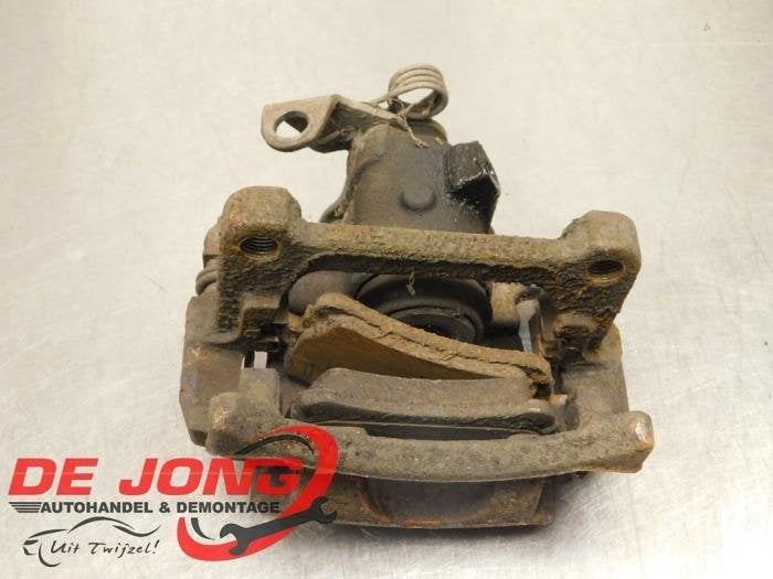 Etrier de frein (pince) arrière gauche d'un Volkswagen Tran, Autos : Pièces & Accessoires, Volkswagen, -, 3 mois de garantie, Utilisé