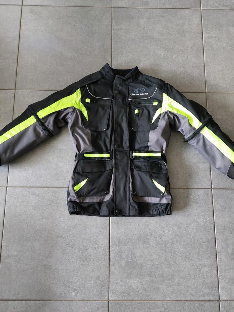 Nieuwe set motorvest en broek maat 164, Ophalen