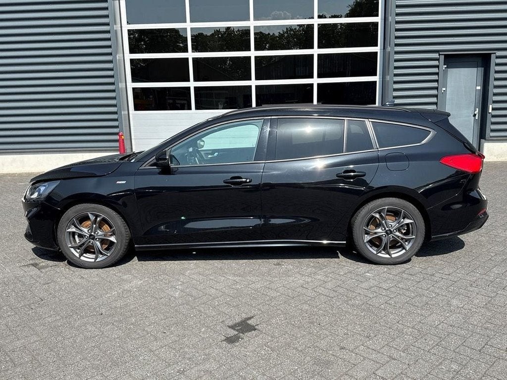 Ford Focus Wagon 1.0 EcoBoost Hybrid ST Line Business, Auto's, Euro 6, Lichtsensor, Zwart, Bedrijf