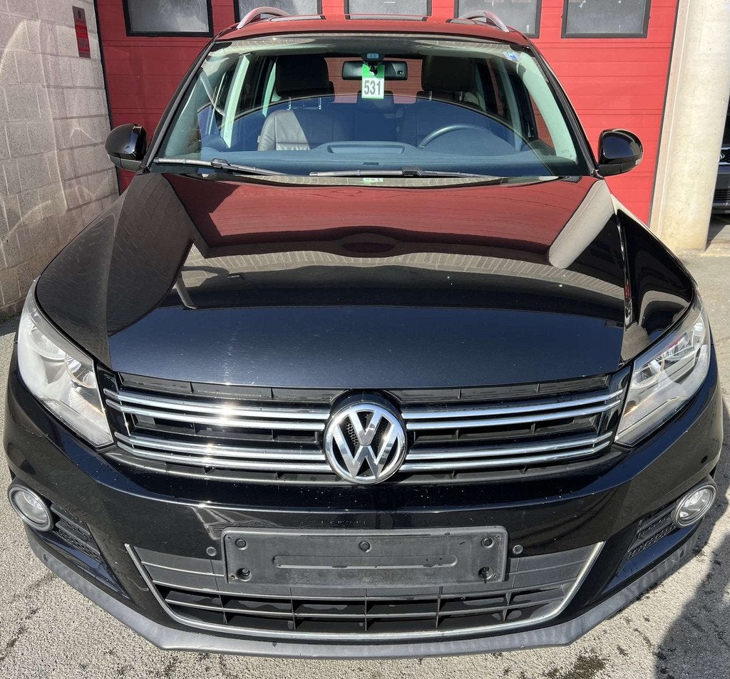 Volkswagen Tiguan 1.4 TSI + CUIR + NAVI (bj 2014), Auto's, 90 kW, Euro 5, 122 pk, Gebruikt