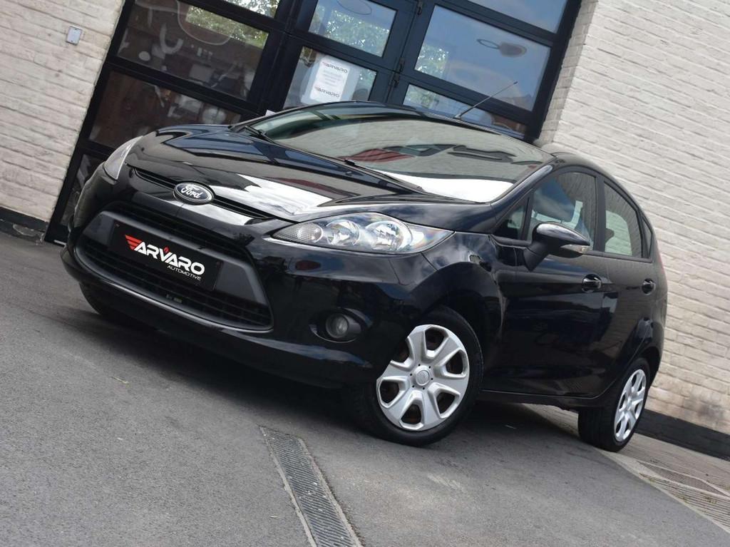 Ford Fiesta 1.25i Titanium / Verw Zetels / Airco / Topstaat, Auto's, Voorwielaandrijving, Euro 5, Stof, Gebruikt