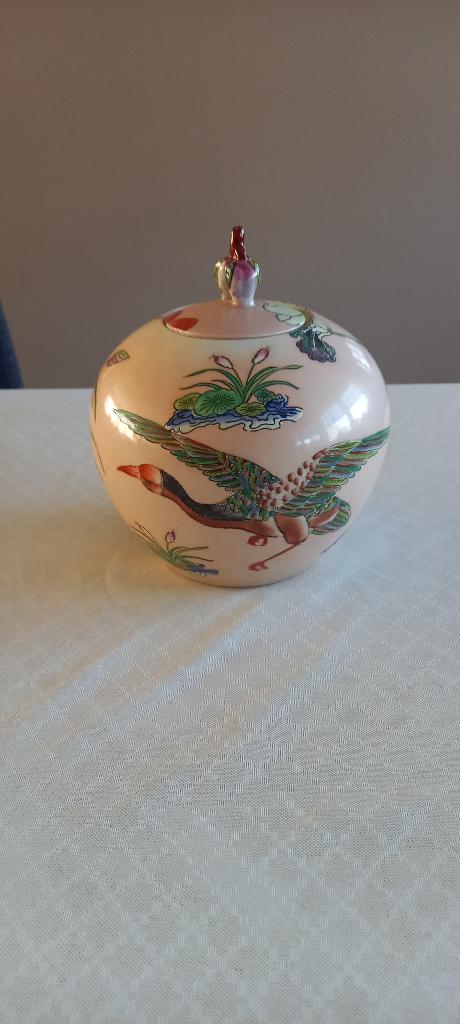 Sierpot met deksel, Ophalen
