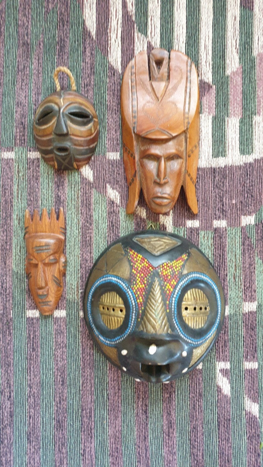 4 masques africains, Enlèvement ou Envoi