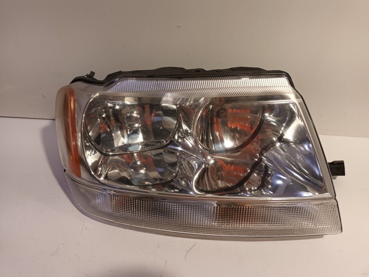 Koplamp rechts Jeep Grand Cherokee, Auto-onderdelen, Jeep, Onderdelen@venauto.nl, Van der Ven Autorecycling B.V., Gebruikt