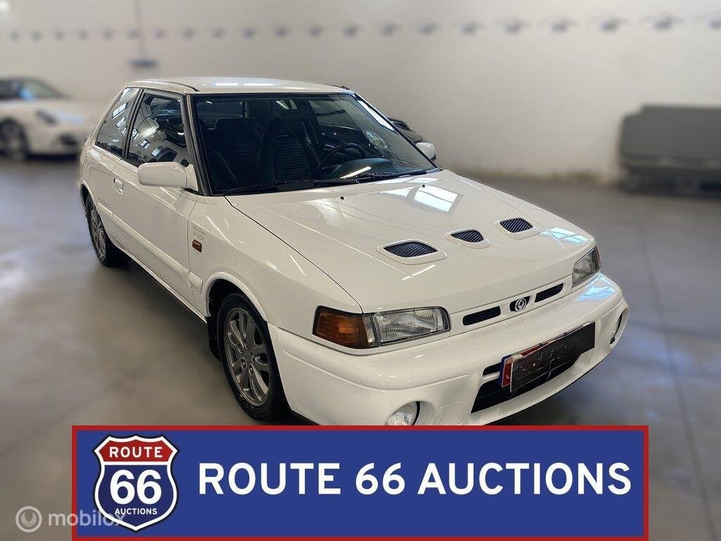 Mazda 323 GT-R | 1992 | Route 66 Auctions, Auto's, Zwart, Bedrijf, Handgeschakeld, Overige carrosserie