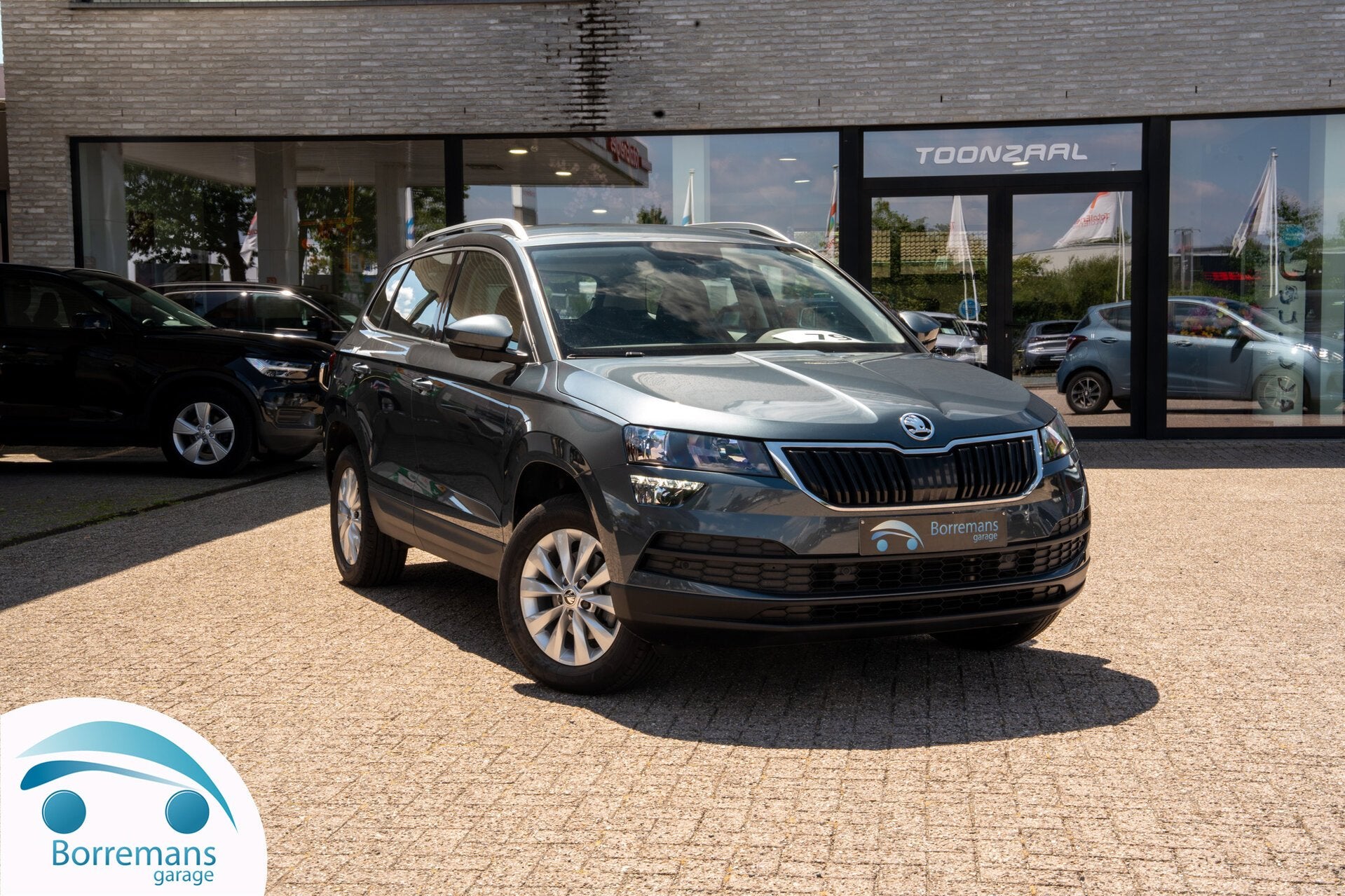 Skoda Karoq | Trekhaak | Camera | CarPlay | Verwarmde zetels, Autos, Skoda, 0 kg, Argent ou Gris, Achat, Euro 6