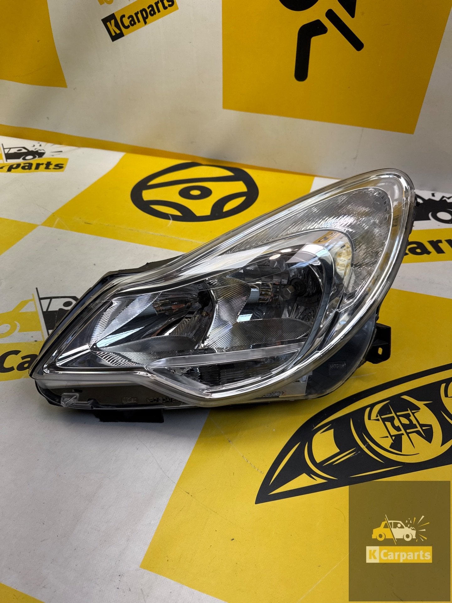 Phare gauche Opel Corsa D 0122940A - Lampe d'origine, Opel Automobile GmbH, Opel, Bahnhofsplatz 1
65423  Russelsheim am Main, DE