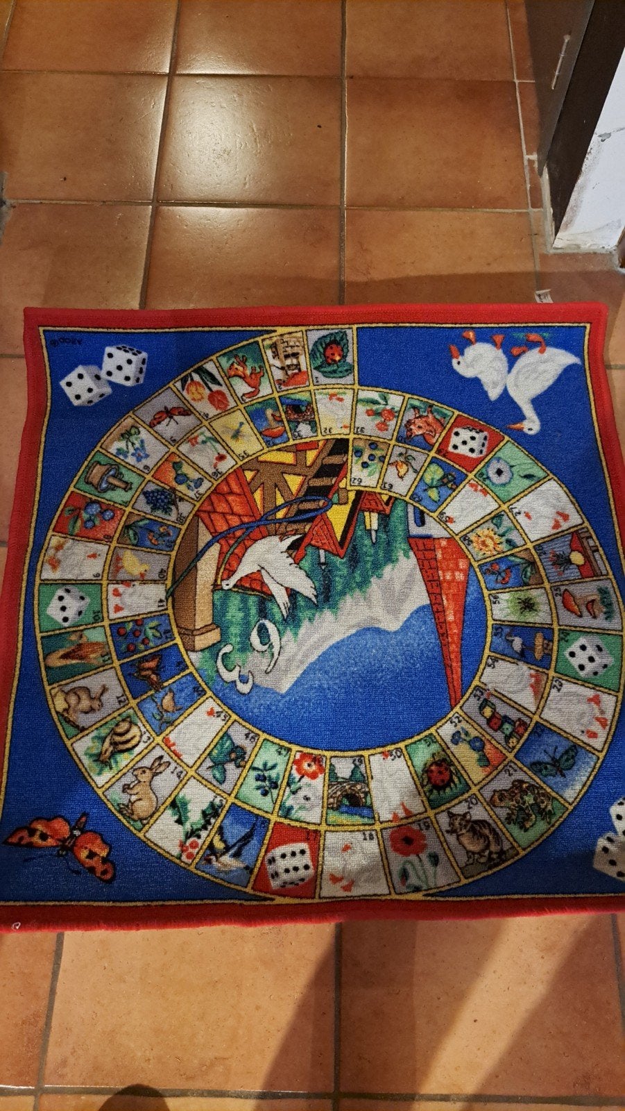 Ganzenbord speelmat, Ophalen