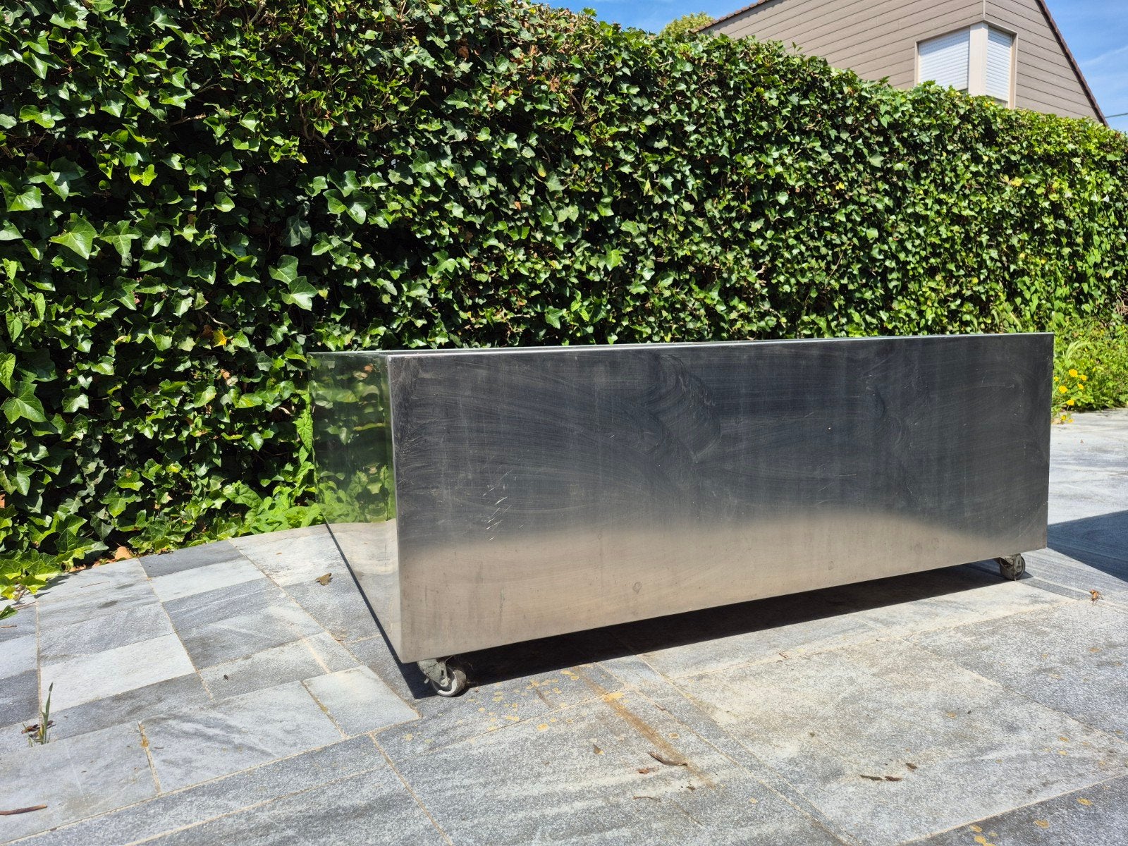 Inox bloembak, Ophalen