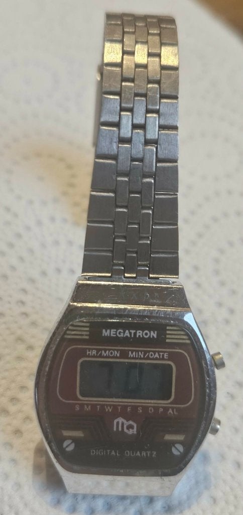 Montre Megatron Vintage Digital Quartz LCD Bra Acier (MW124), Enlèvement ou Envoi