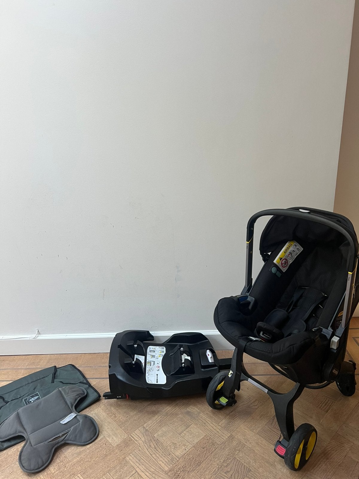 Doona+ autostoel + isofix + newborn insert + zetelbeschermer, Gebruikt, Isofix, 0 t/m 13 kg, Ophalen