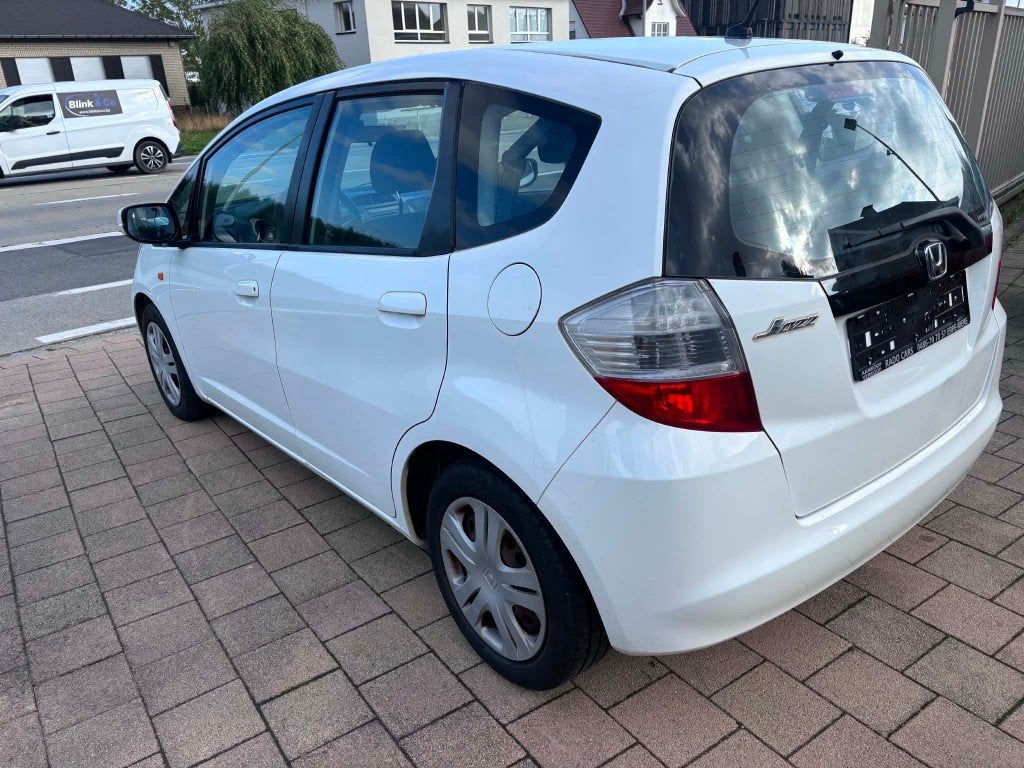 Honda jazz benzine van 2009, Auto's, https://public.car-pass.be/vhr/d2f18b8d-df6b-4980-bfc7-b801c45ecb5c, Wit, Bedrijf, 66 kW