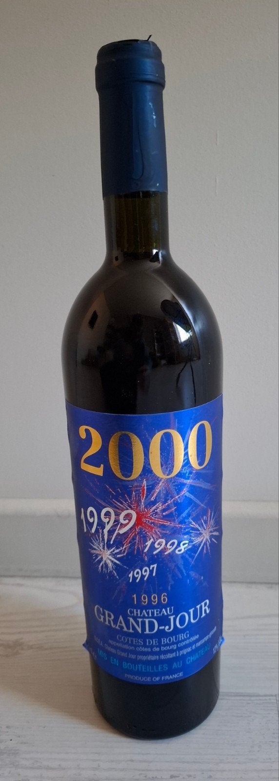 fles wijn jaar 2000 viering, Ophalen