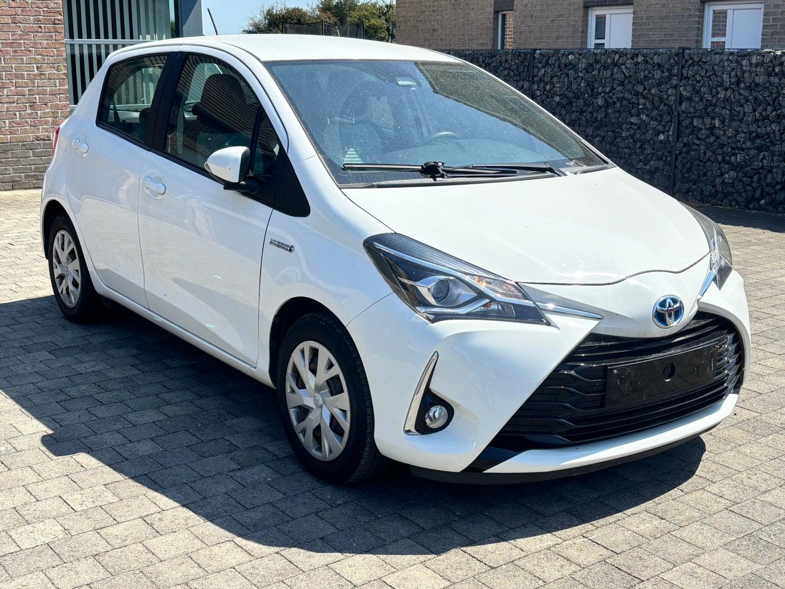 Toyota Yaris Hybrid 64000 km uit 2020, Auto's, Toyota, Stof, Euro 6, 4 cilinders, Navigatiesysteem