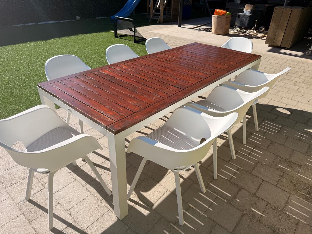 Bristol teak tafel met 8 witte stoelen en kussens, Ophalen of Verzenden, Zo goed als nieuw, Rechthoekig, Hout