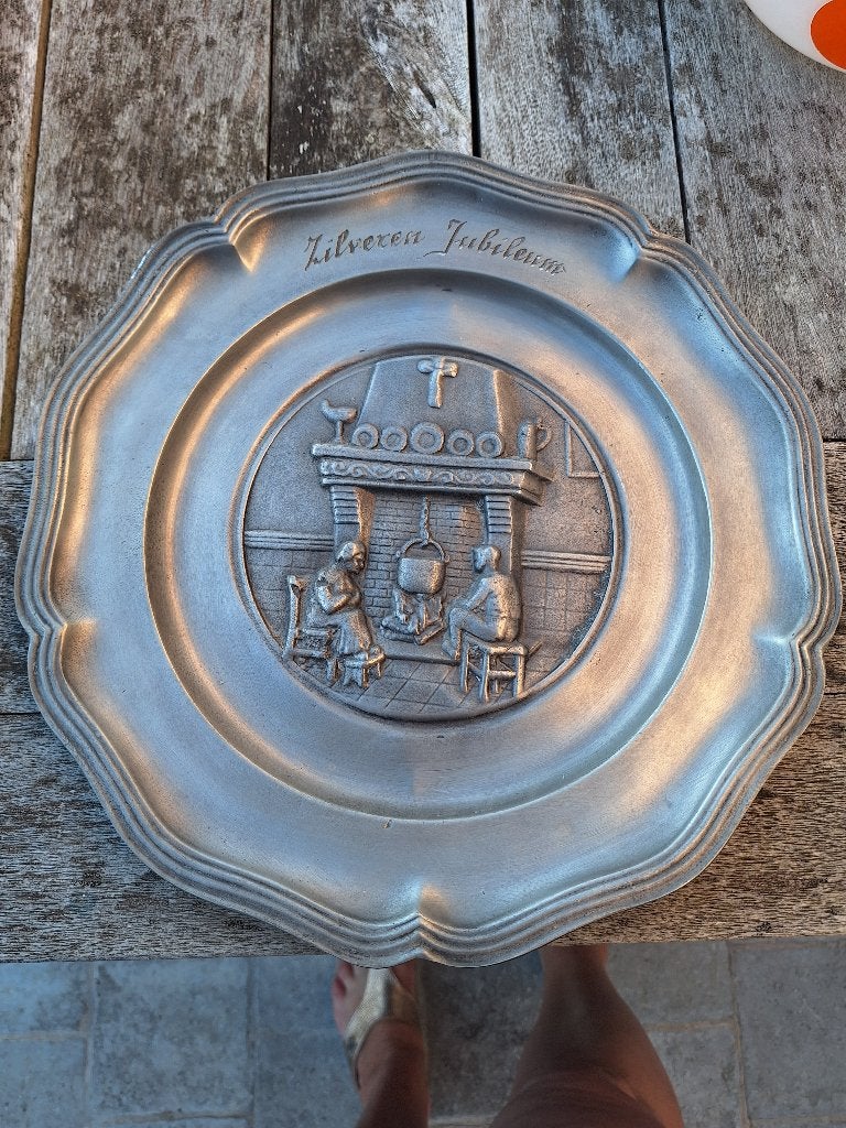 Tinnen bord, Ophalen