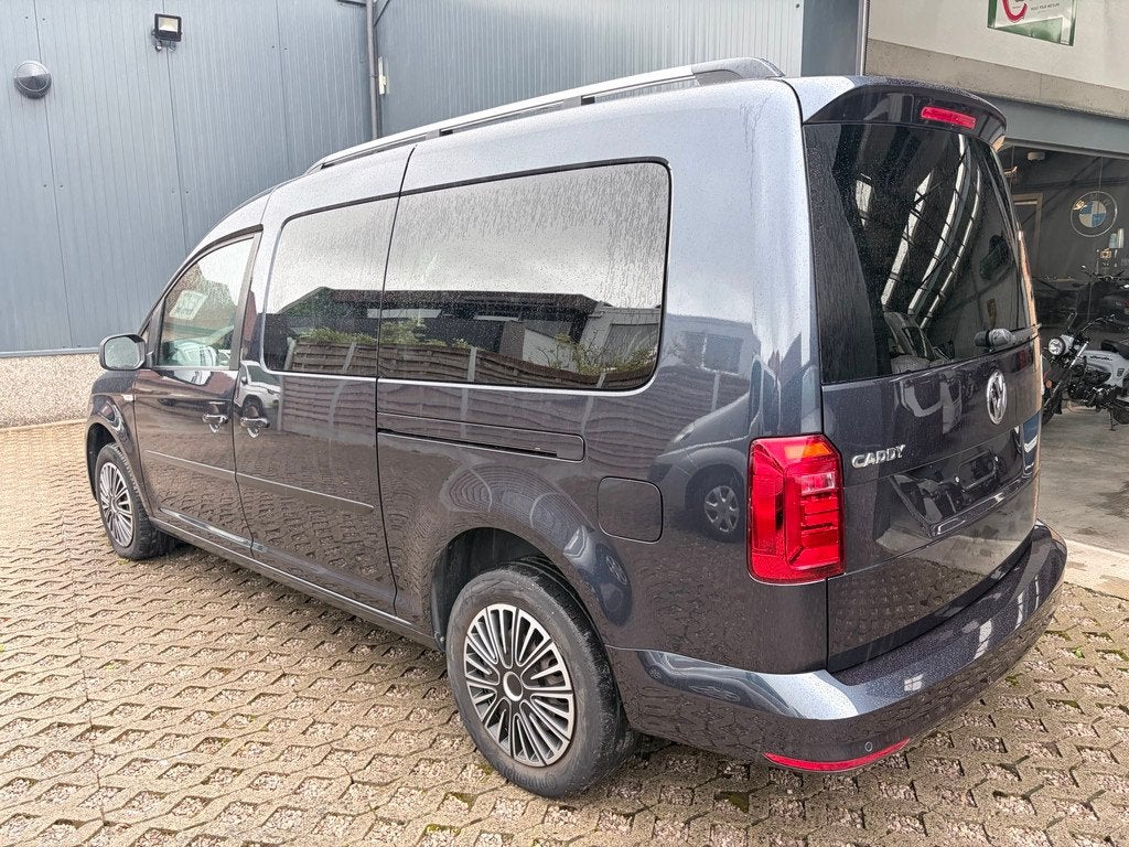 Volkswagen Caddy 7 zitplaatsen - CNG+benzine - Automaat, Auto's, Gebruikt, 4 cilinders, CNG (Aardgas), Blauw