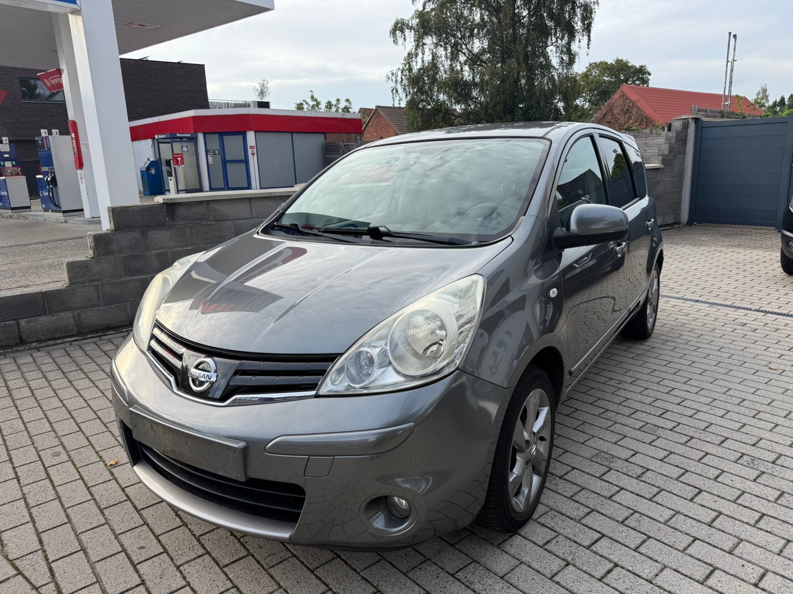 Nissan Note bj2011 1 eig 1.4 Benzine 110451km, Auto's, Voorwielaandrijving, Stof, 139 g/km, 4 cilinders