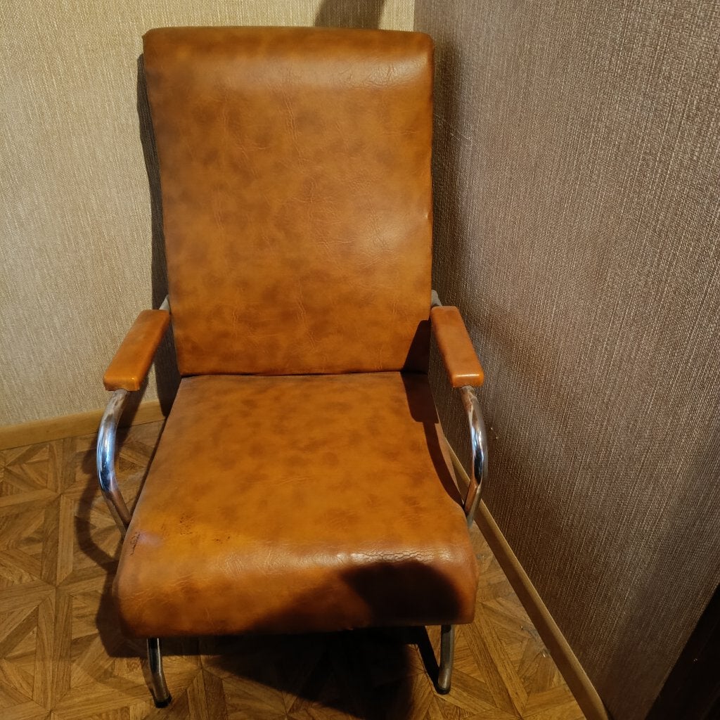 2 Vintage buisframe fauteuil met bruine/cognac kleurige skai, Ophalen