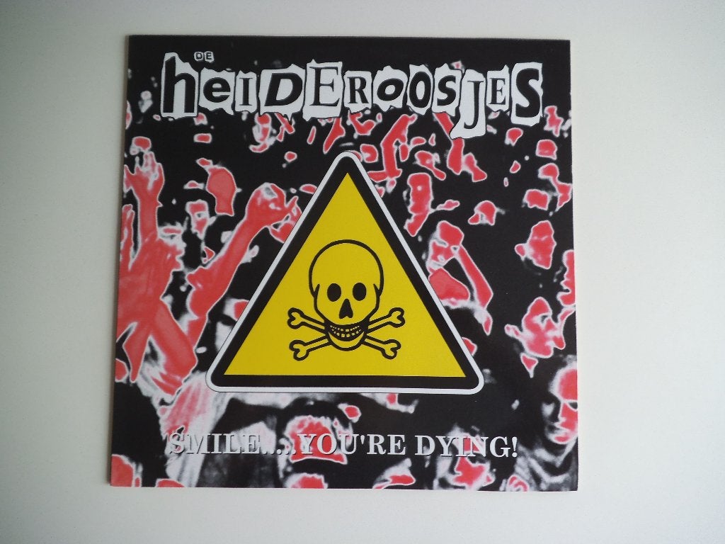 LP De heideroosjes Smile... you're dyingI  Red vinyl 1998, LP, Gebruikt, Colored vinyl, Ophalen of Verzenden