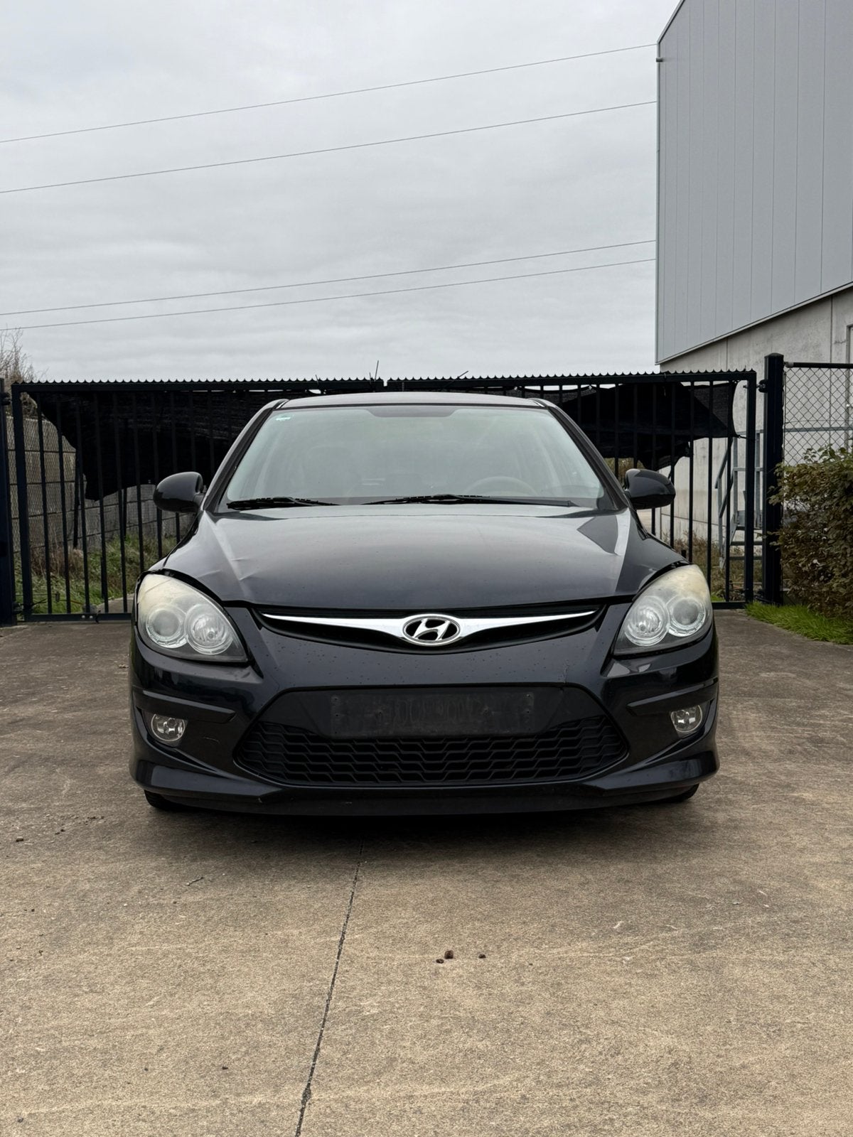Hyundai i30 2011 EURO 5, Auto's, Voorwielaandrijving, Euro 5, Stof, Zwart