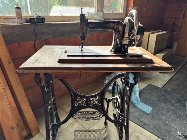 oude naaimachine, Ophalen
