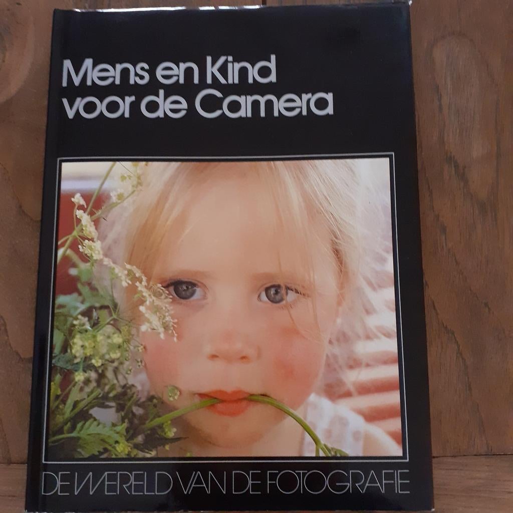 Mens en kind voor de camera, Ophalen, Gelezen, Fotografie algemeen