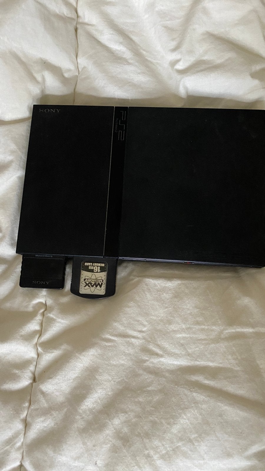Playstation 2 met 2 memory kaarten, 2 controllers en 4 games, Gebruikt, Verzenden, Zwart, Met games