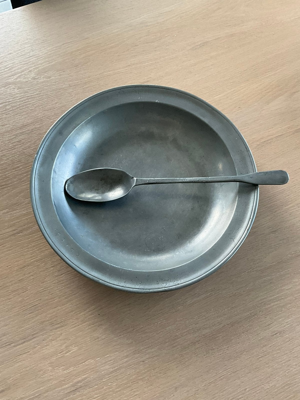 Tinnen schotel, Ophalen