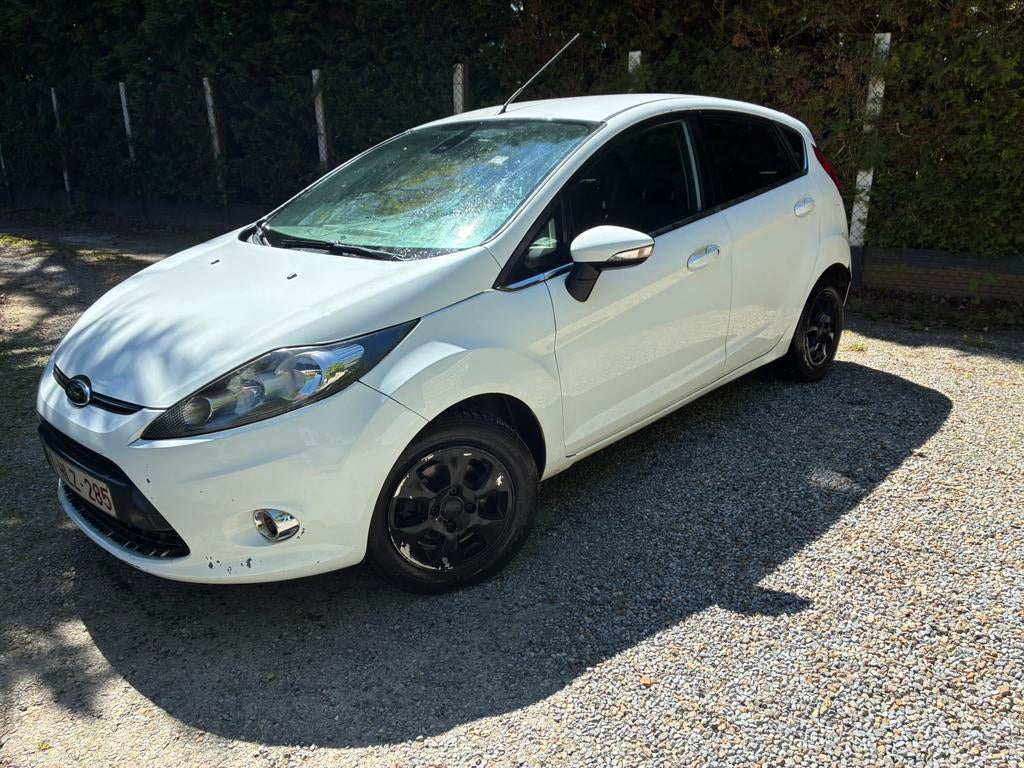 Te koop fiesta 2011, Auto's, Ford, Voorwielaandrijving, Euro 5, Stof, Zwart