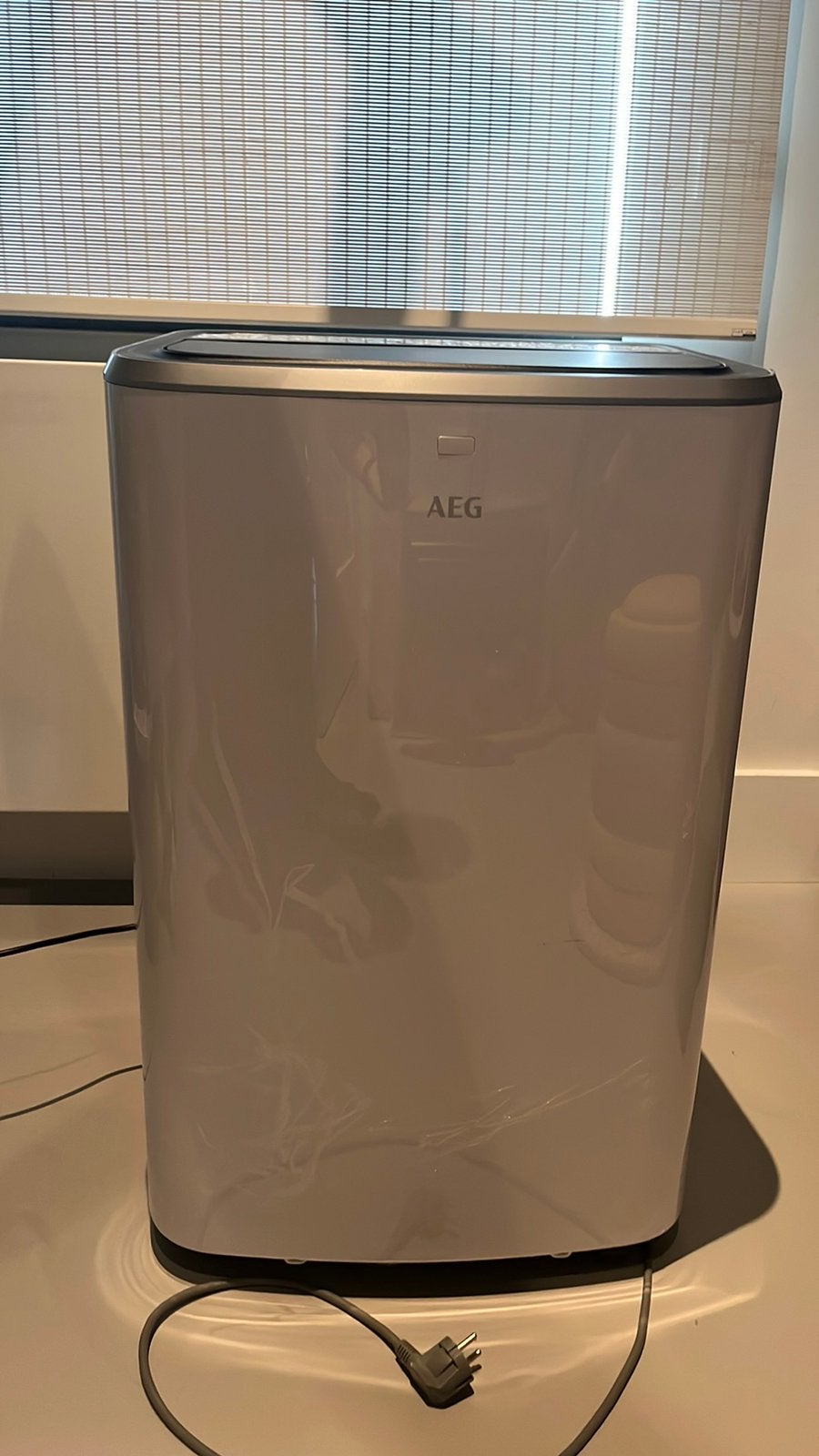Mobiele airco AEG, Ophalen, Zo goed als nieuw