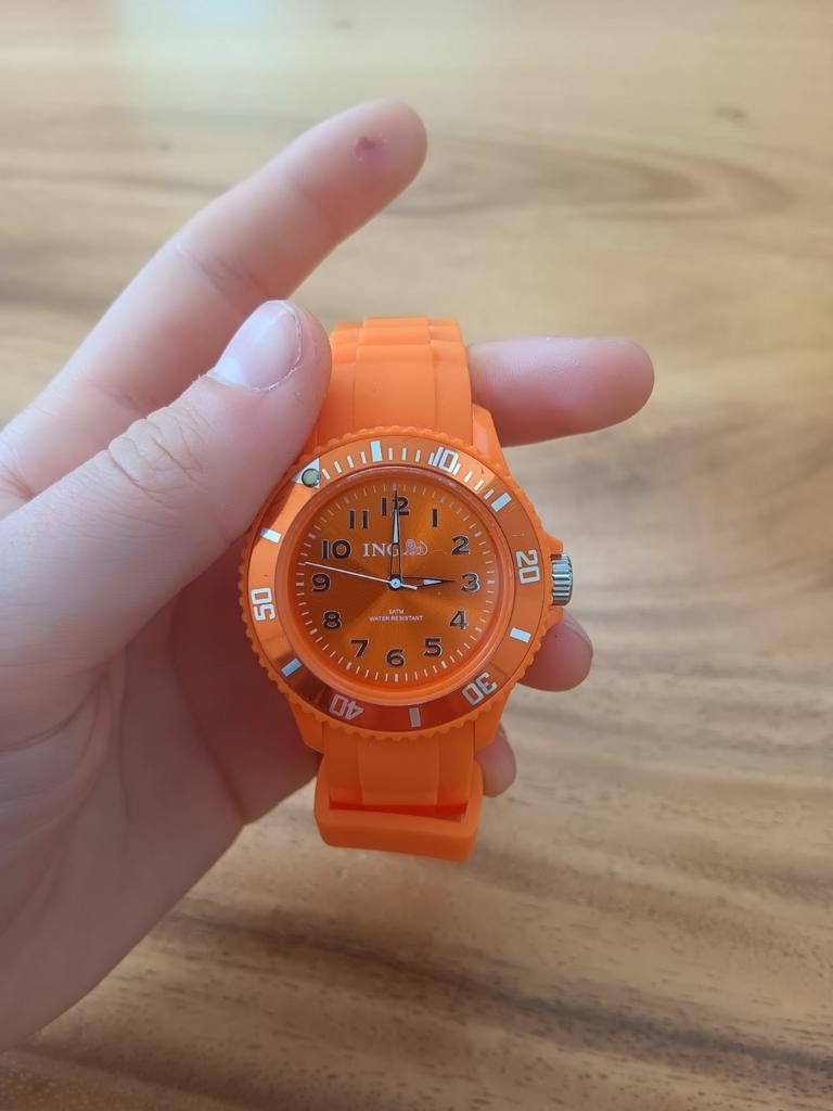Mooi oranje horloge te koop., Enlèvement, Orange