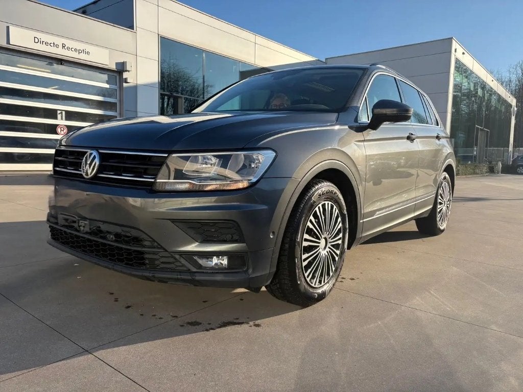 Volkswagen Tiguan Tiguan 2.0 TDi SCR Comfortline BMT DSG, Auto's, Volkswagen, 4 cilinders, Parkeersensor, 127 g/km, Leder