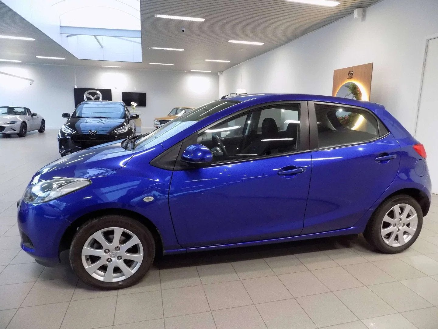 Mazda 2 1.3i 86pk Active (bj 2009), Stof, Gebruikt, 4 cilinders, Blauw