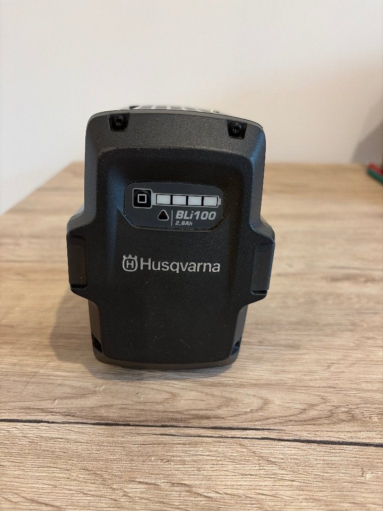 Batterie Husqvarna Bli100, Jardin & Terrasse, Enlèvement, Comme neuf, Batterie, Huskvarna