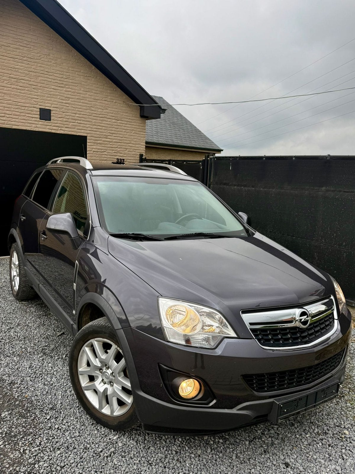 Opel Antara 2.4i 168 PK, Auto's, Opel, Monovolume, Zwart, Leder, 5 deurs