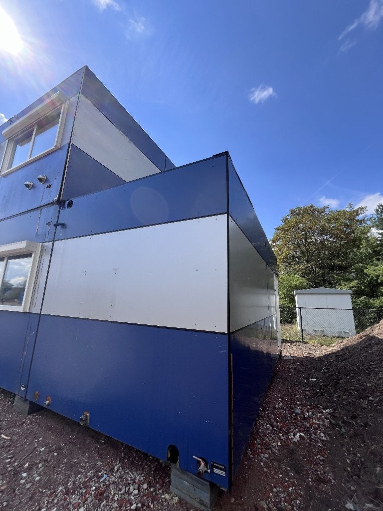 Multifunctioneel unitgebouw met 21 units, Ophalen