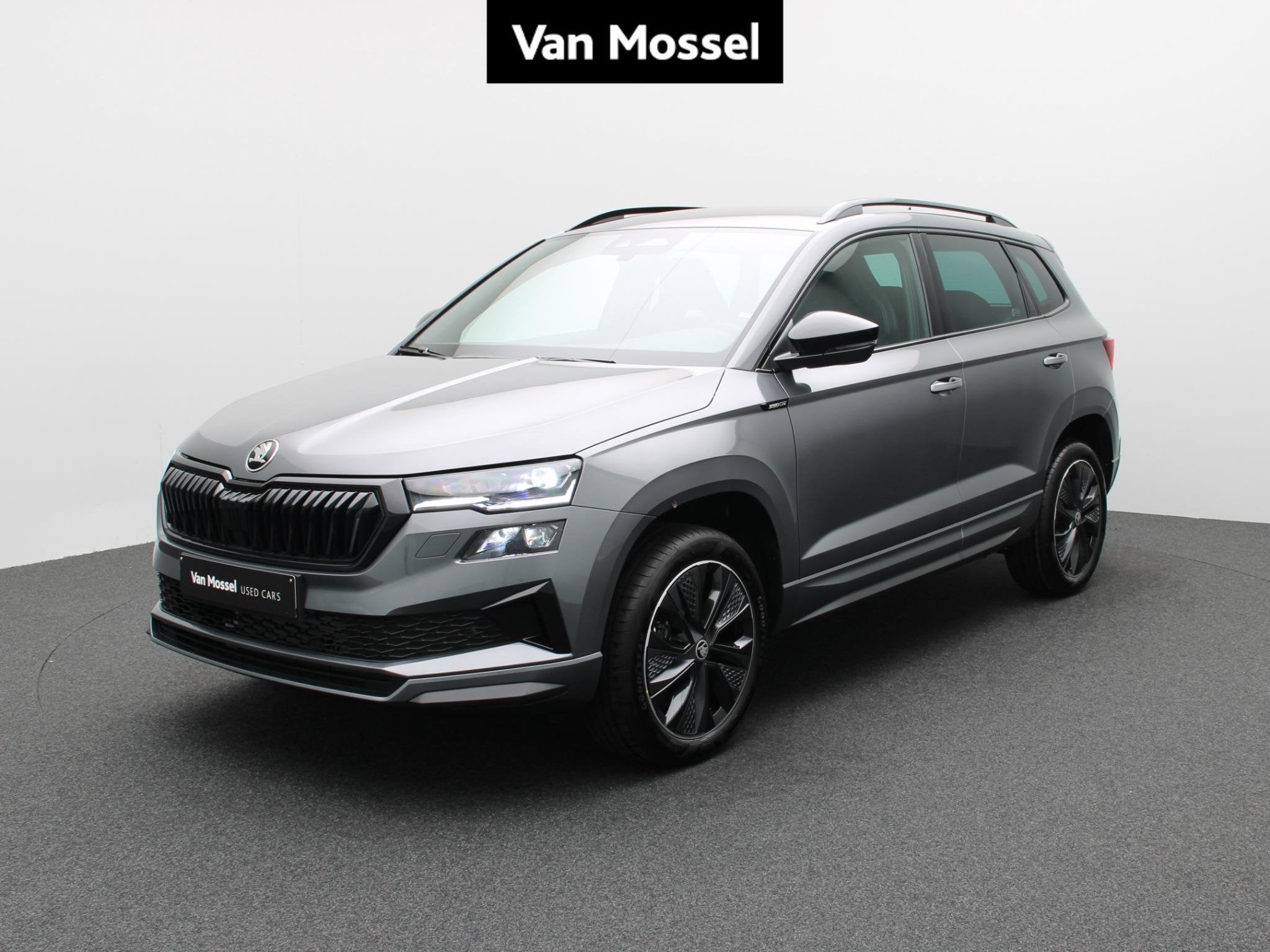 Skoda Karoq 1.5 TSI 110kW DSG7 Sportline, Stof, 110 kW, 4 cilinders, Elektrische koffer