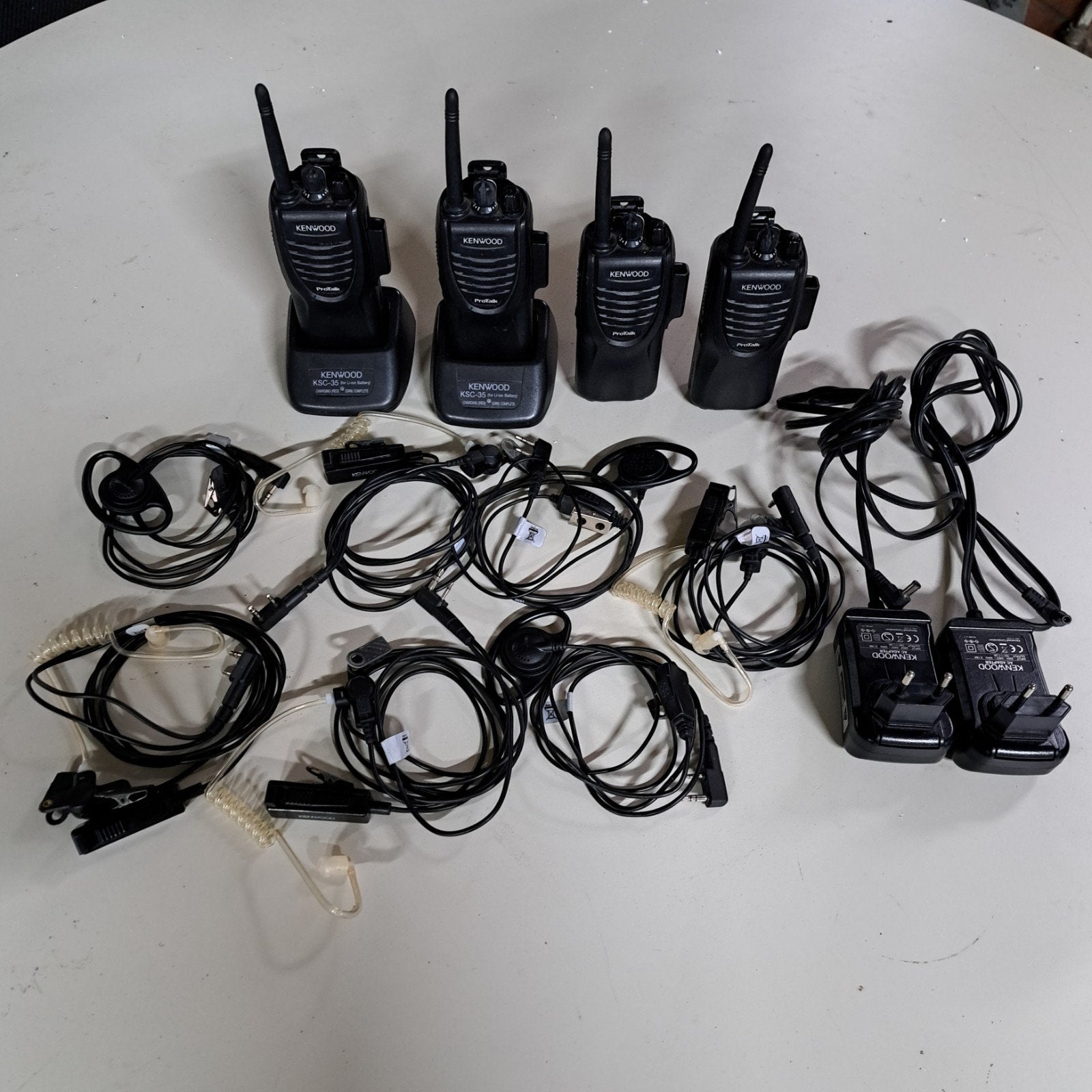 kenwood Protalk set van 4 met oortjes en 2 laders, Ophalen of Verzenden
