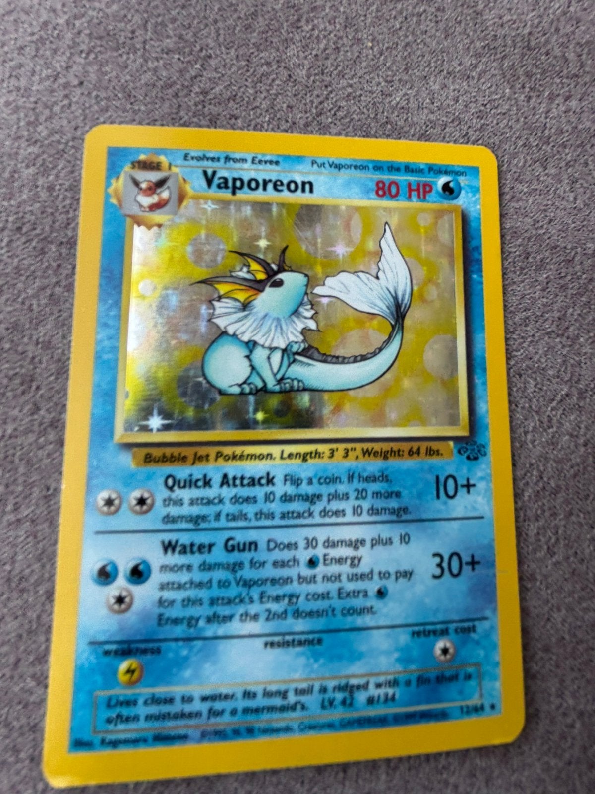 Pokémon Vaporeon 12/64, Enlèvement ou Envoi, Comme neuf, Cartes en vrac