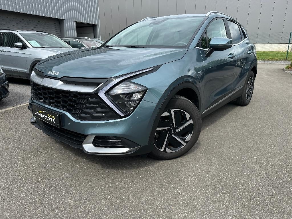Kia Sportage, 1.6 benzine + elektrisch, HEV, CARPLAY/ CAMERA, Auto's, Stof, 4 cilinders, 1600 cc, 127 g/km